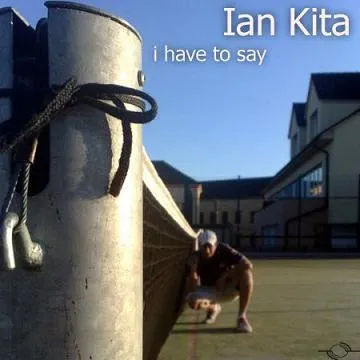 Black and white studio portrait of Ian Kita